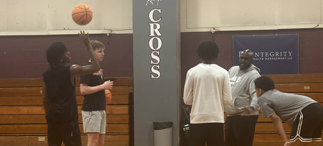 Players working on shooting form at a Baseline Hoops shooting session